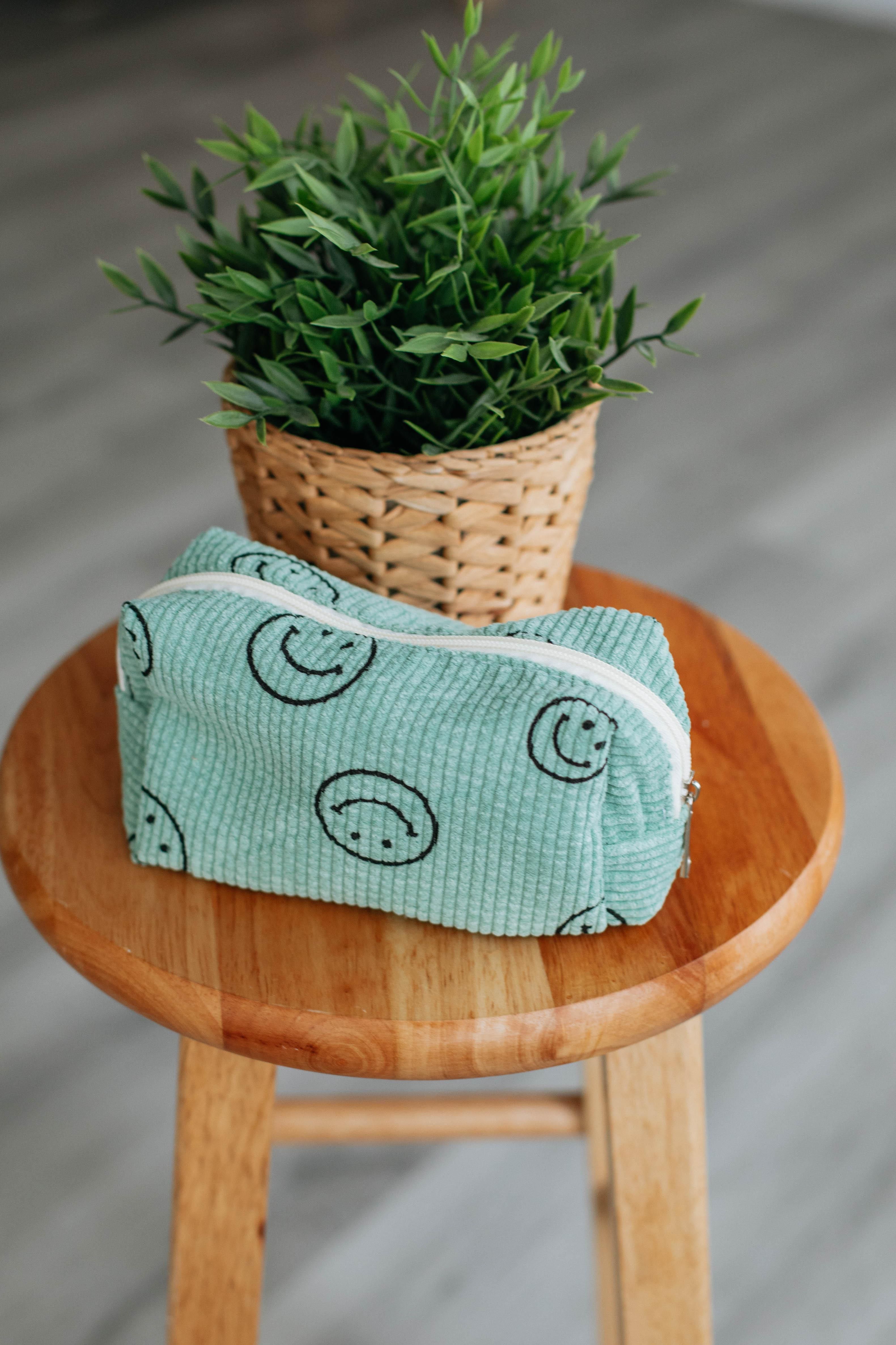 All Smiles Cosmetic Bag sold by Wild Oak Boutique