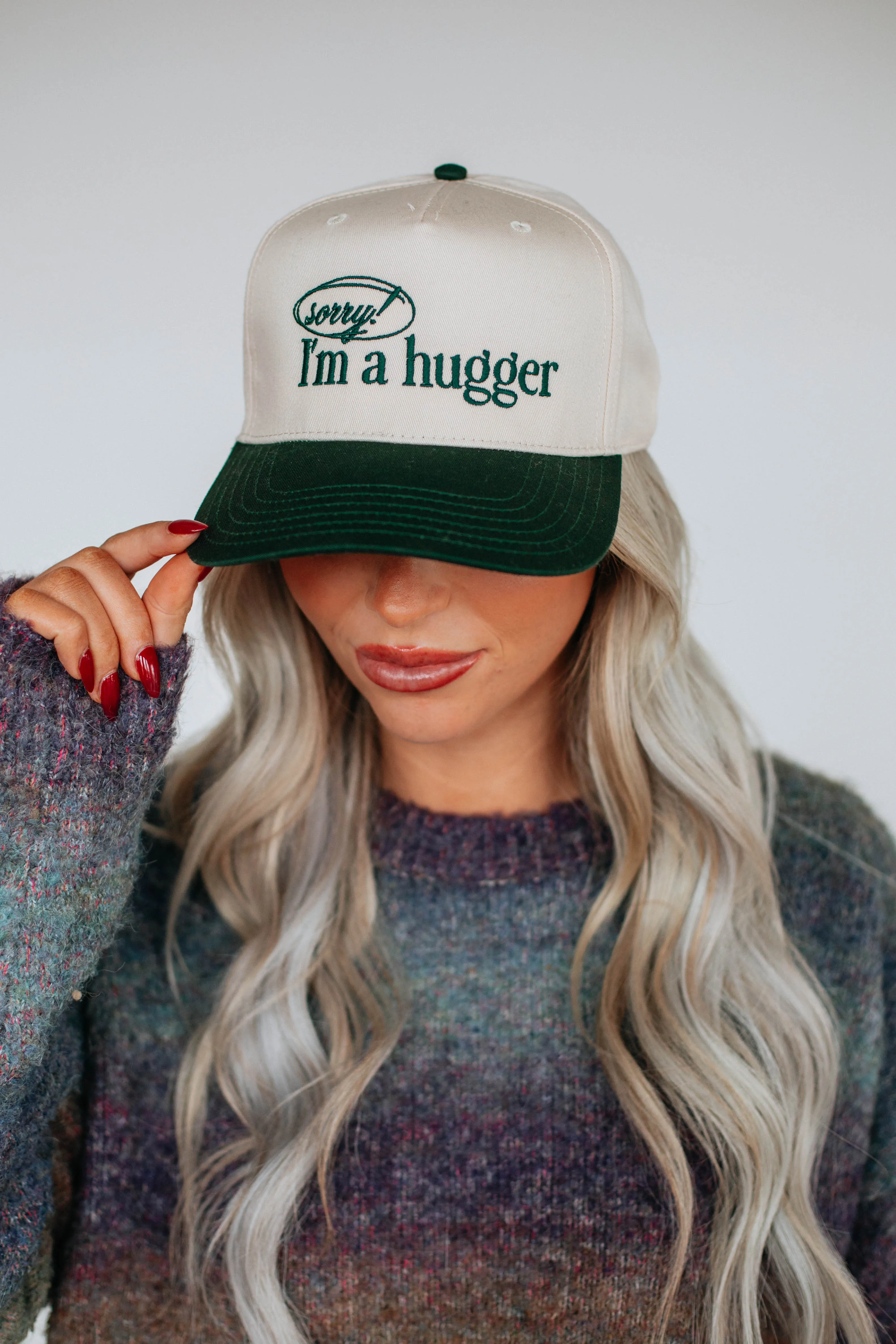 Sorry I'm A Hugger Trucker Hat sold by Wild Oak Boutique