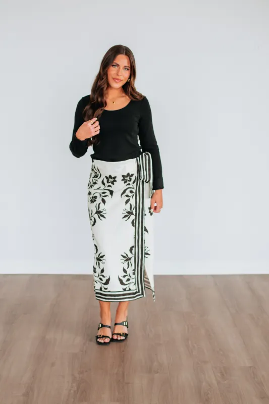 Carryn Floral Wrap Skirt sold by Wild Oak Boutique