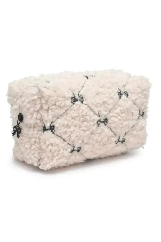 Bow & Behold Cosmetic Pouch sold by Wild Oak Boutique