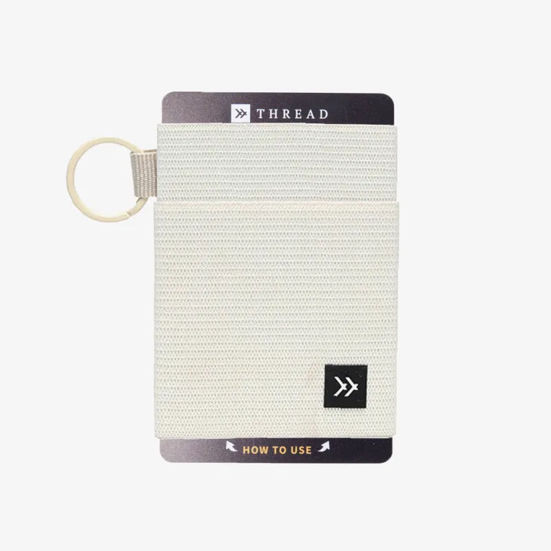 Off White sold by Thread Wallets
