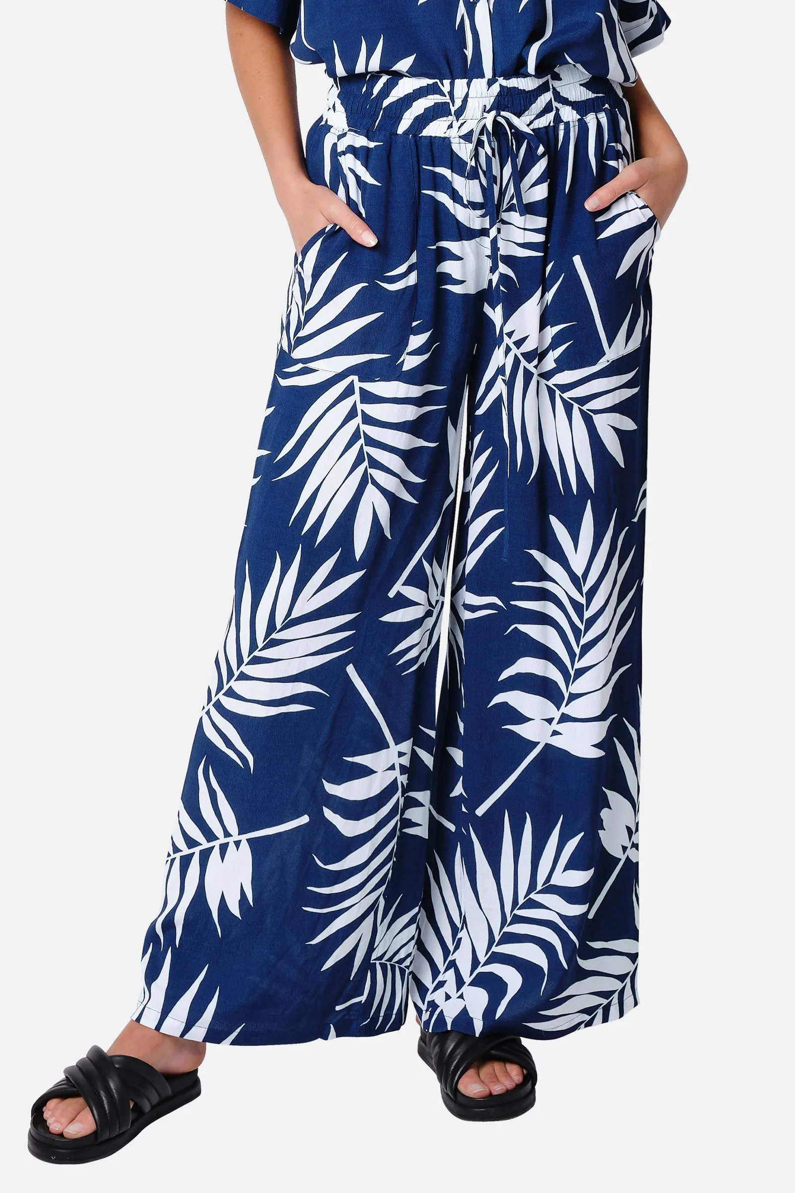 Palazzo Pants PALM SILHOUETTE NAVY sold by UNE PIECE