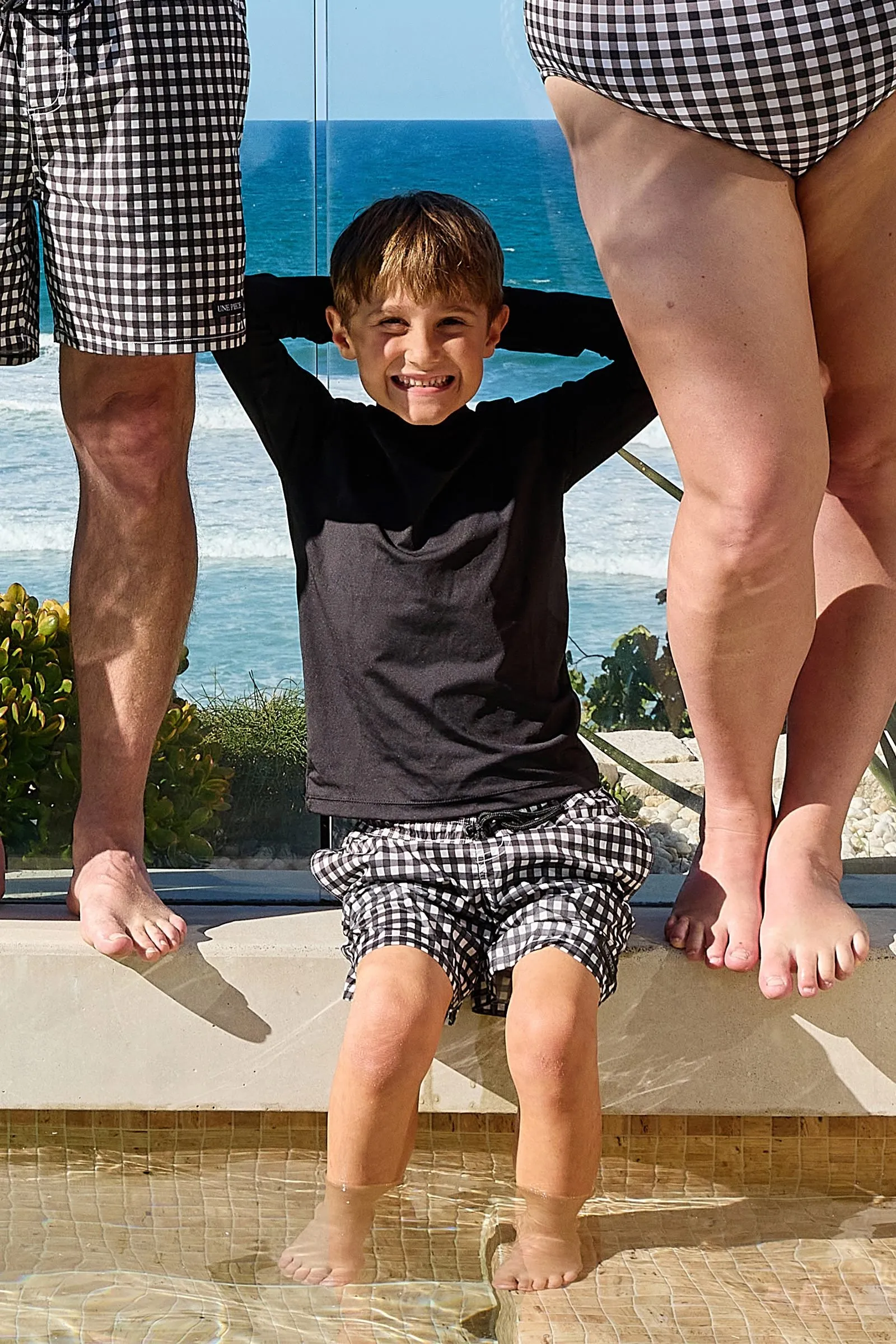 Boys Swim Shorts BLACK GINGHAM sold by UNE PIECE