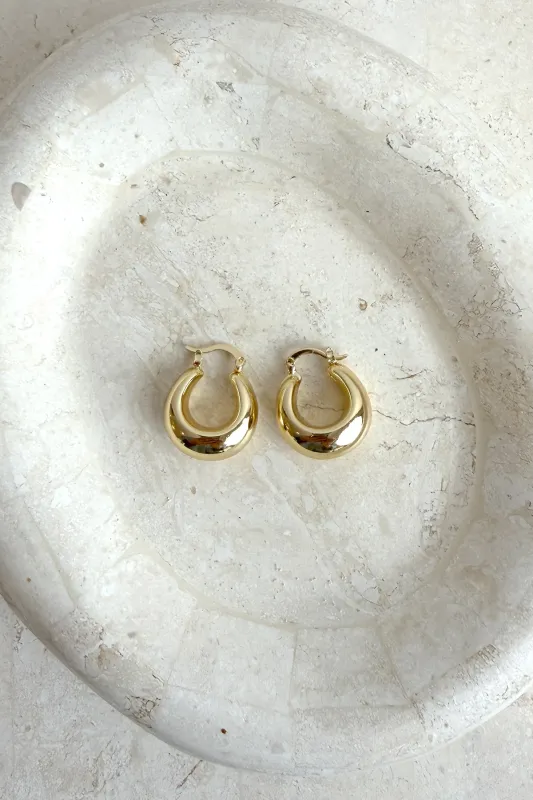 Gold Huggie Hoops made by UNE PIECE