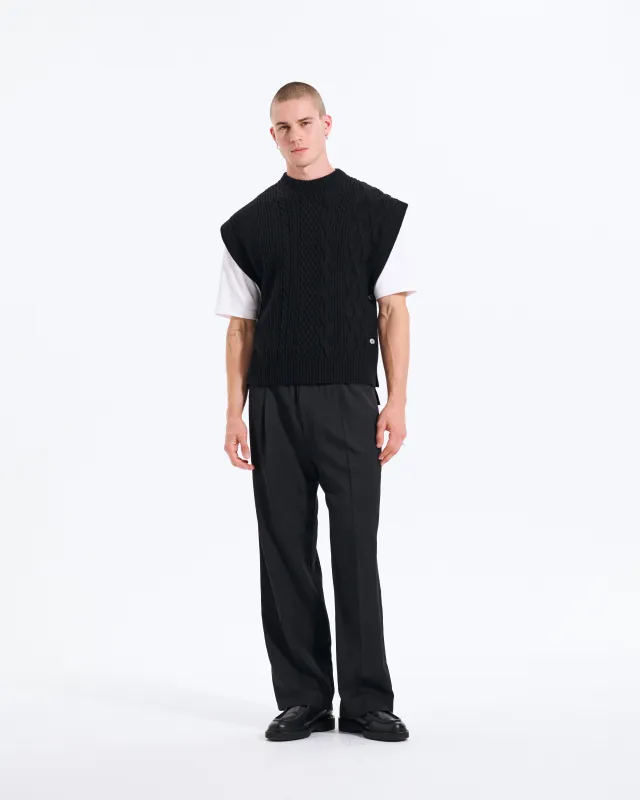 Cable Vest sold by Mackintosh