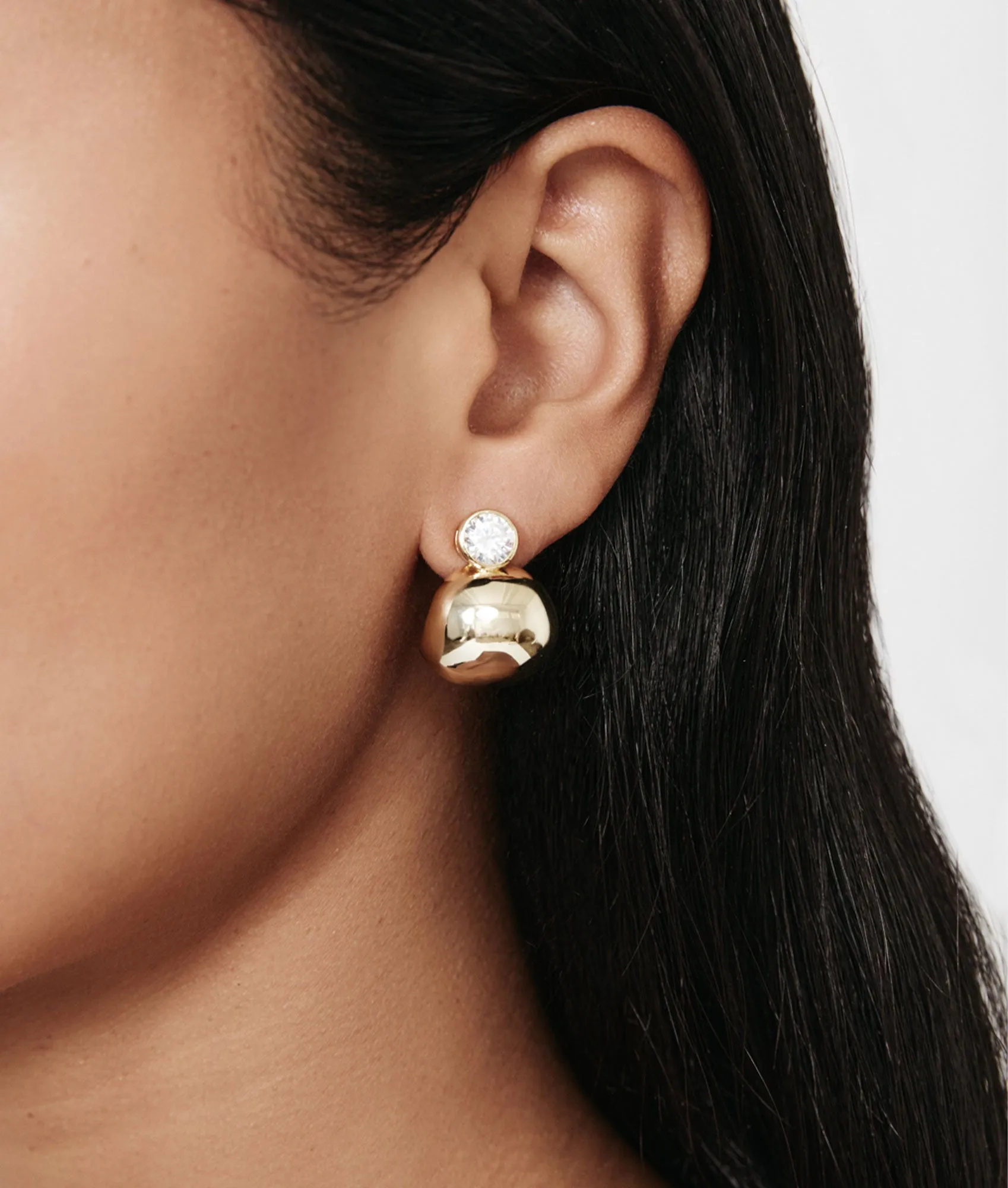 Bezel Gold Earring sold by Shashi