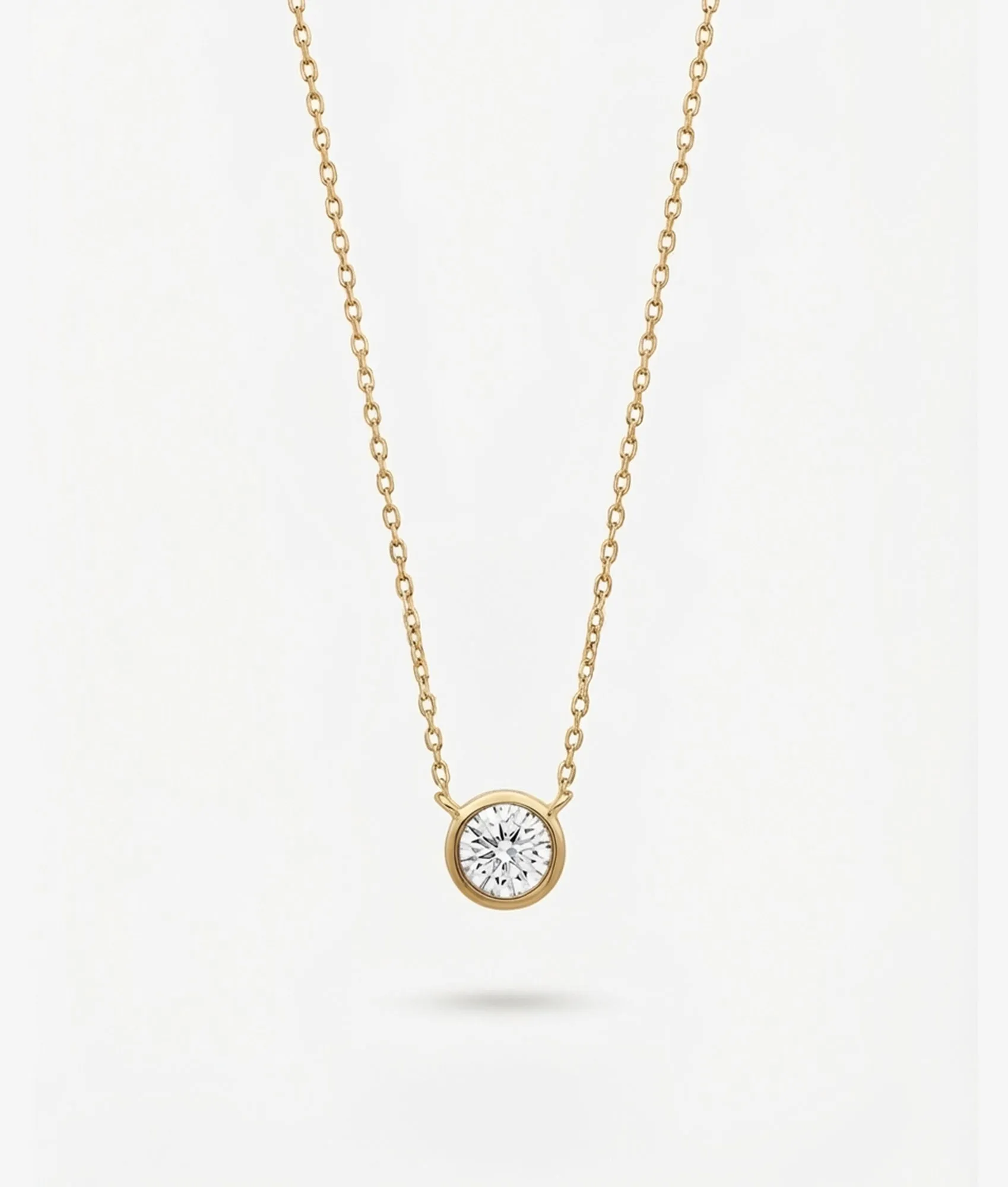Bezel Solitaire Moissanite Necklace sold by Shashi