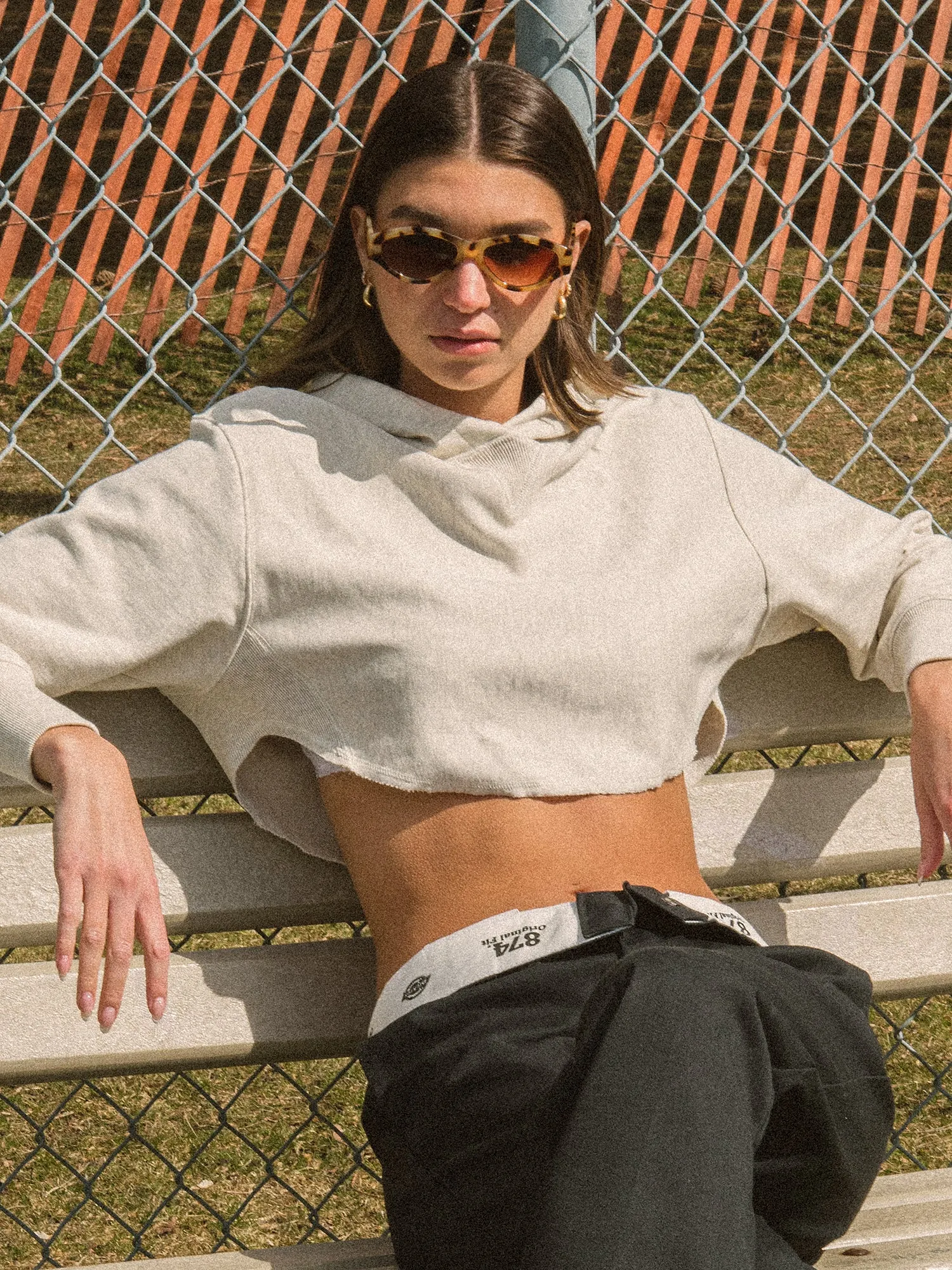 CHAMPION REVERSE WEAVE CROP CURVE HEM HOODIE sold by Boathouse