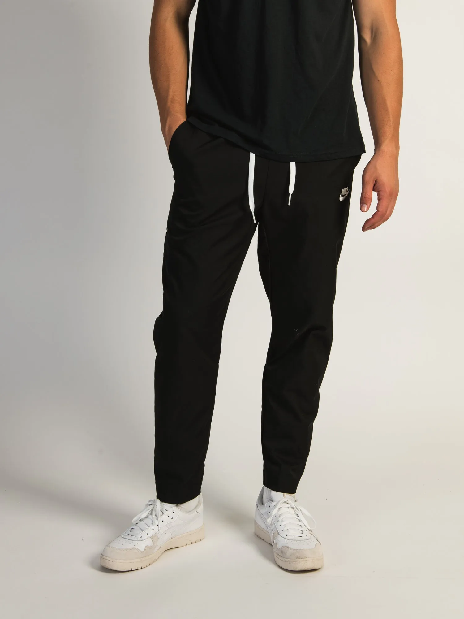 NIKE WOVEN TAPERED LEG PANT sold by Boathouse