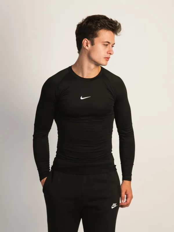 NIKE DRI-FIT LONG SLEEVE FITNESS TOP sold by Boathouse