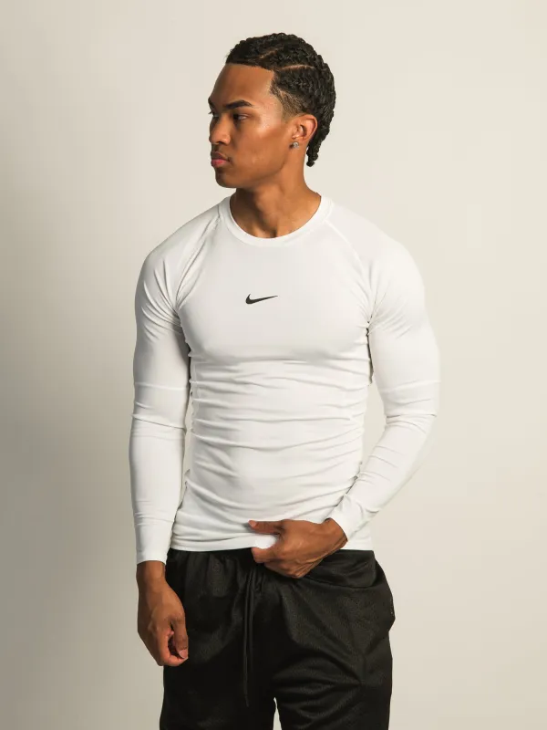 NIKE DRI-FIT LONG SLEEVE FITNESS TOP sold by Boathouse
