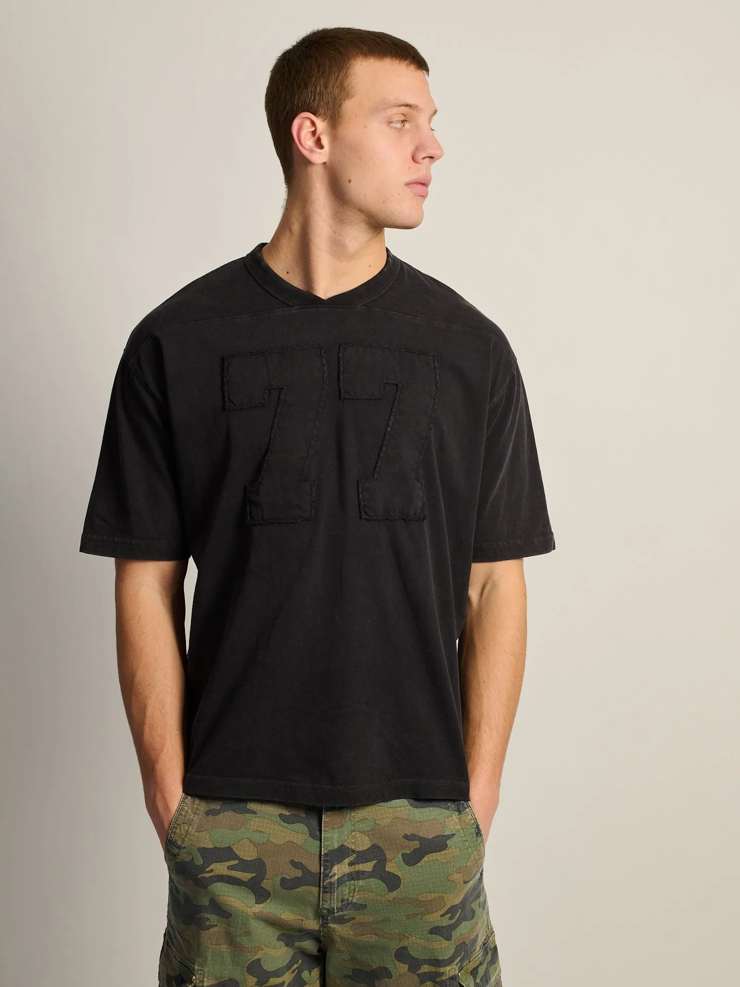 KOLBY LOOSE FIT FOOTBALL TEE - BLACK sold by Kolby