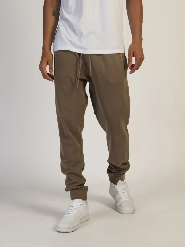 KOLBY GARMENT DYE SLIM JOGGER sold by Kolby