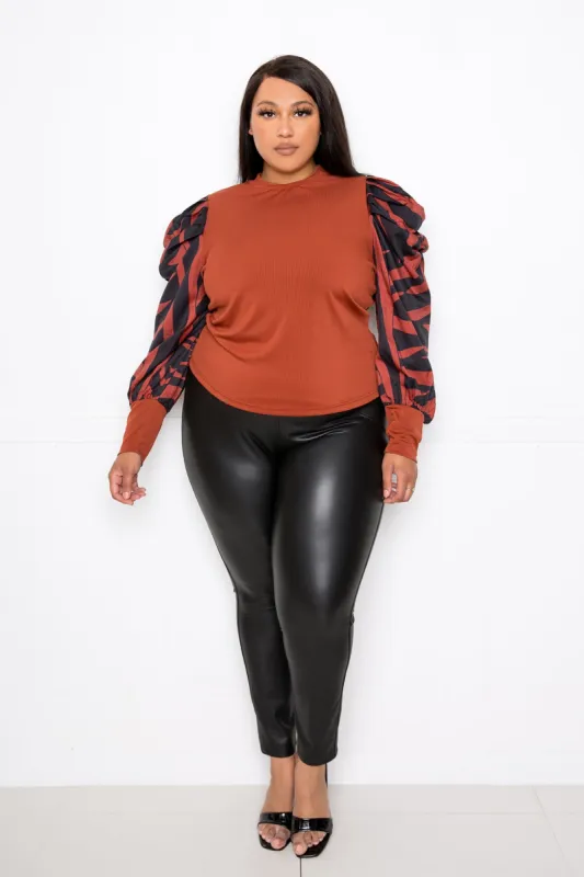 Ribbed Top with Animal Print Sleeves sold by Buxom Couture