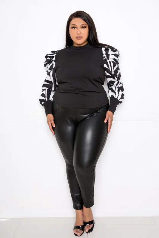 Ribbed Top with Animal Print Sleeves sold by Buxom Couture