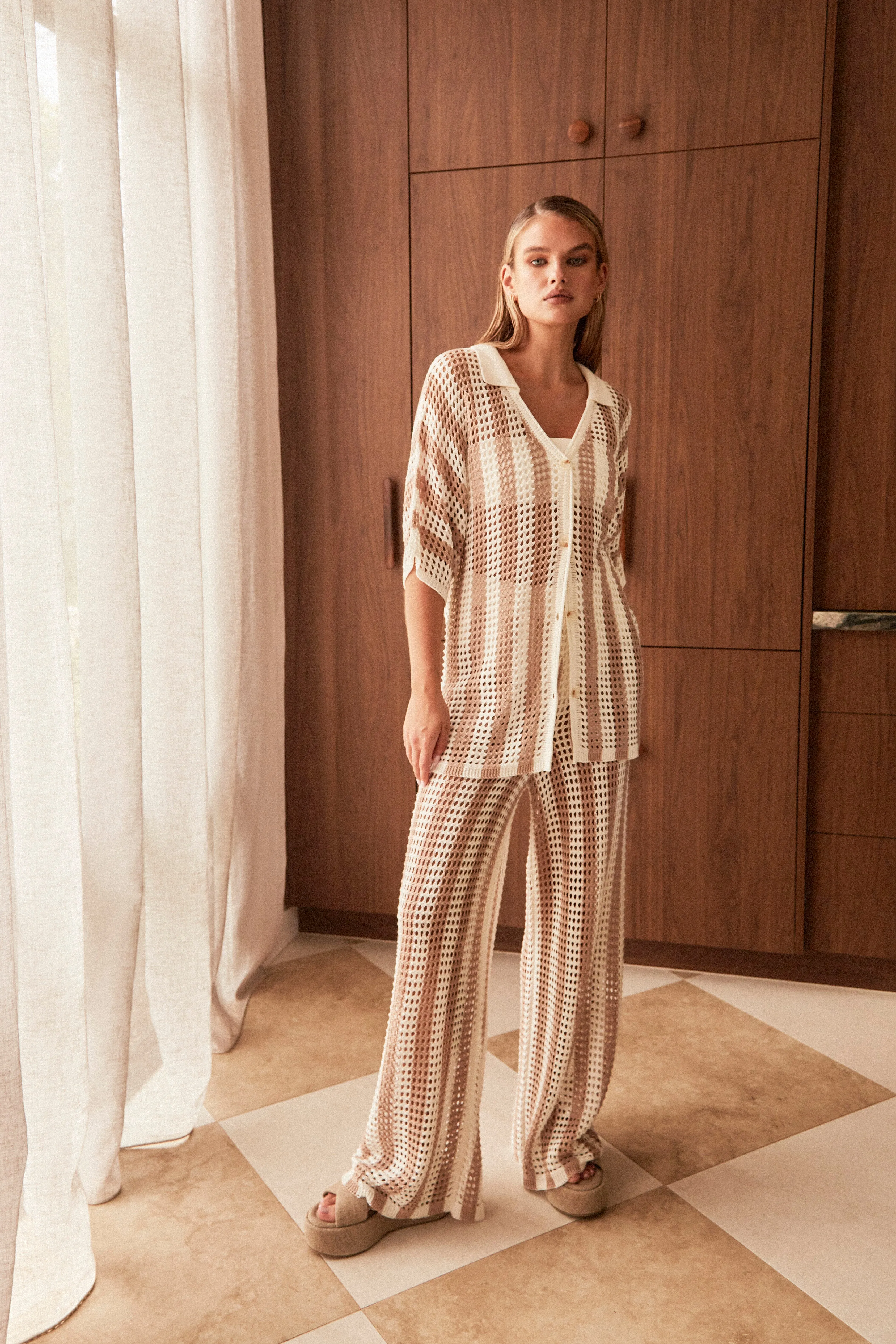 Mirage Knit Pant (Beige) sold by Runway Scout