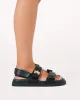 Alvina Sandal (Black) sold by Runway Scout