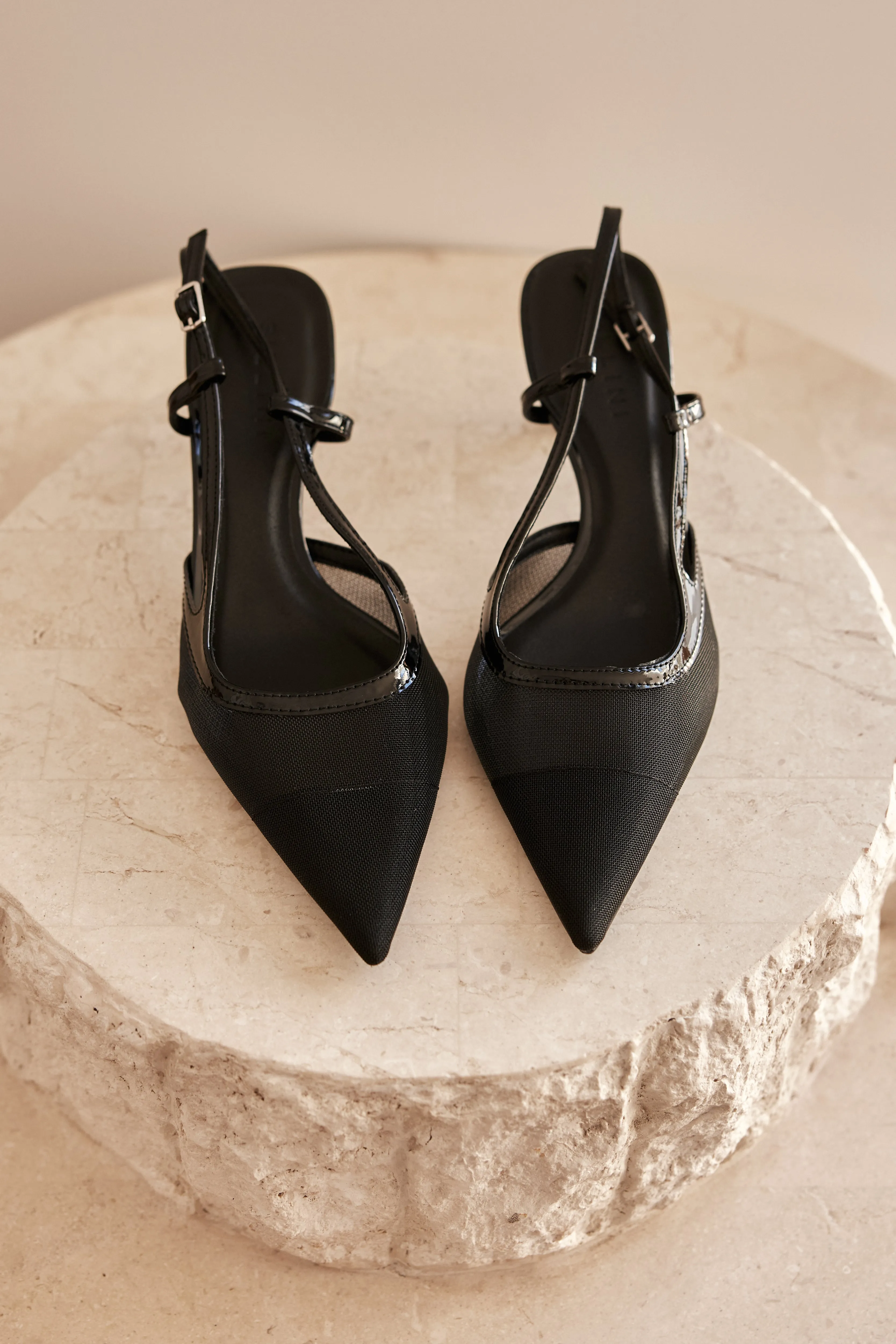 Hawley Heels (Black) sold by Runway Scout