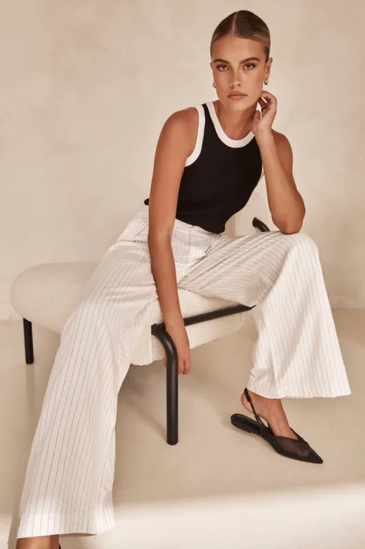 Davie Pant (White) sold by Runway Scout