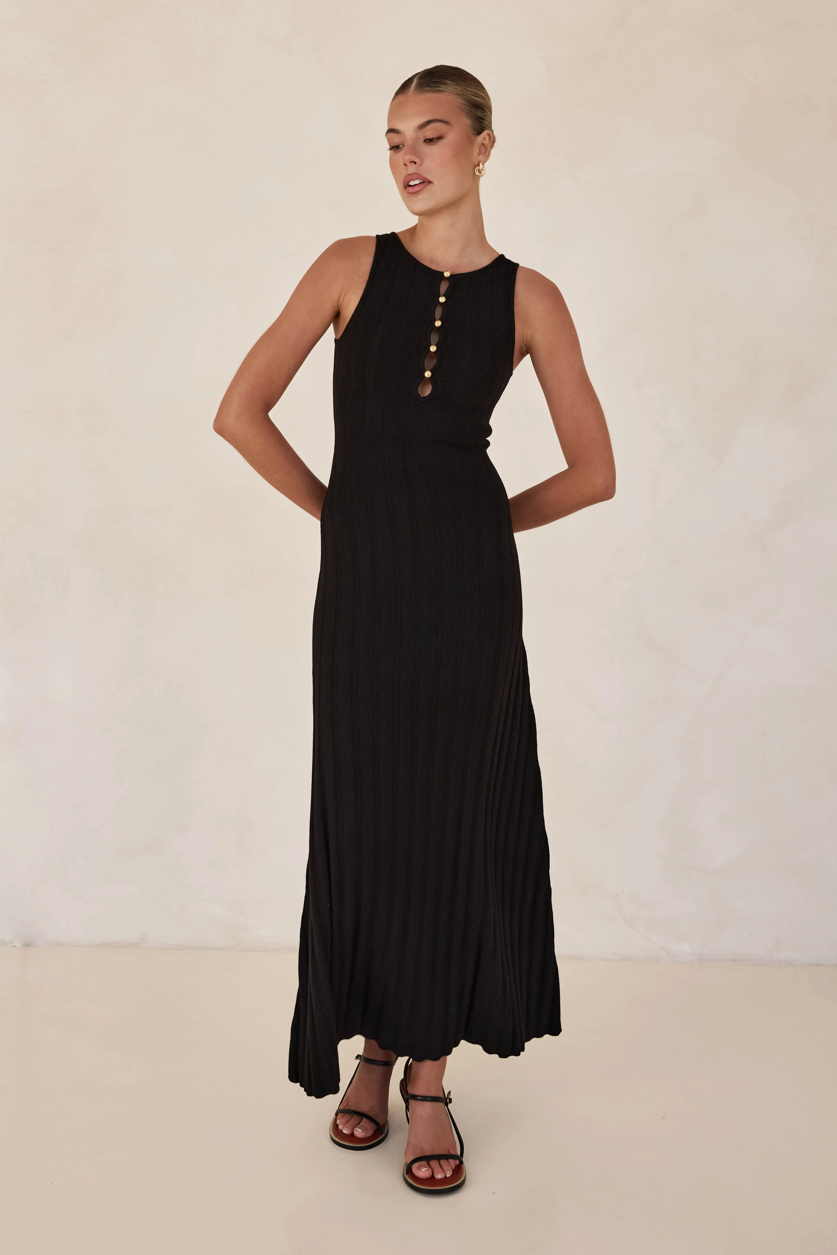 Corina Knit Maxi Dress (Black) sold by Runway Scout