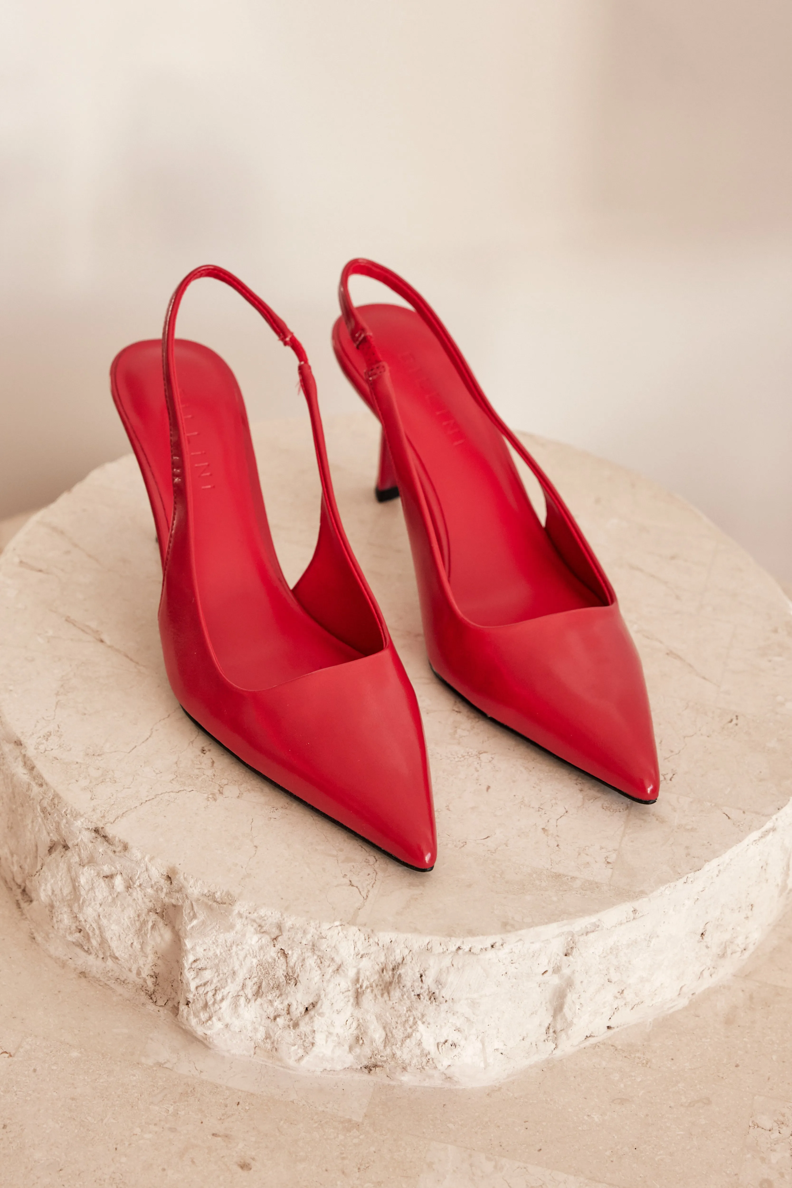 Idana Heels (Red) sold by Runway Scout