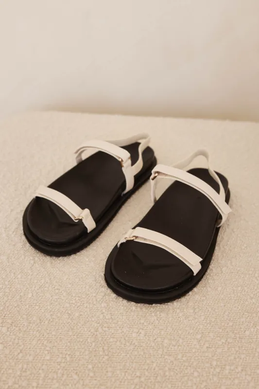 Tasa Sandals (Ivory) sold by Runway Scout