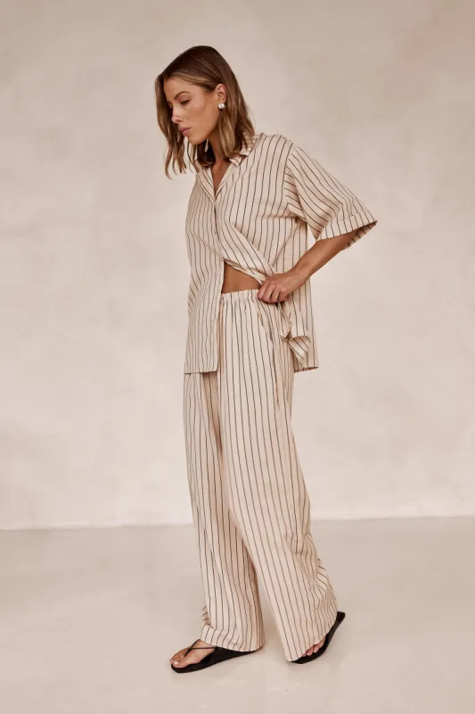 Norah Set (Beige) sold by Runway Scout