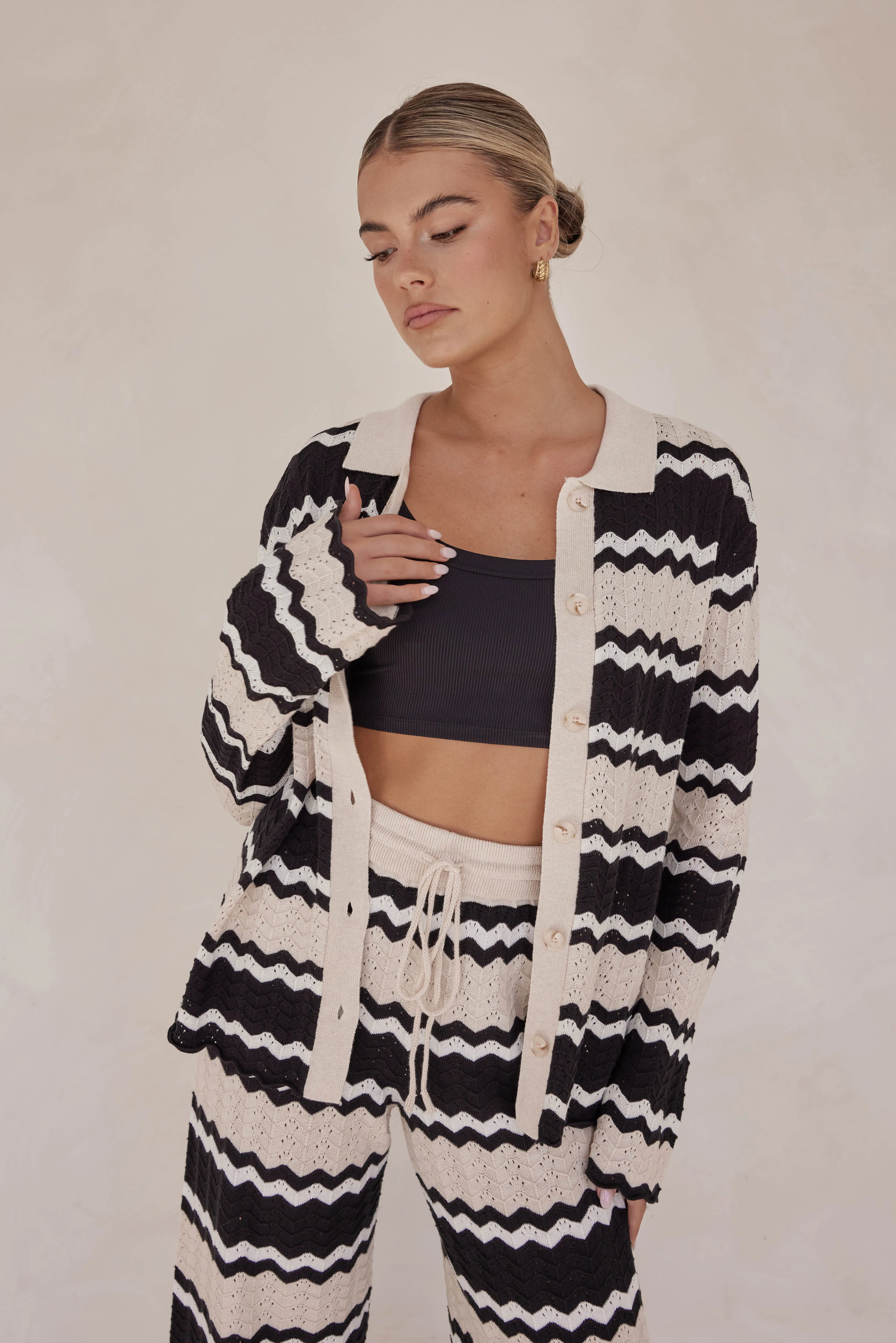 Lucca Knit Shirt (Black) sold by Runway Scout