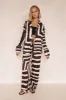 Sola Pant (Chocolate) sold by Runway Scout