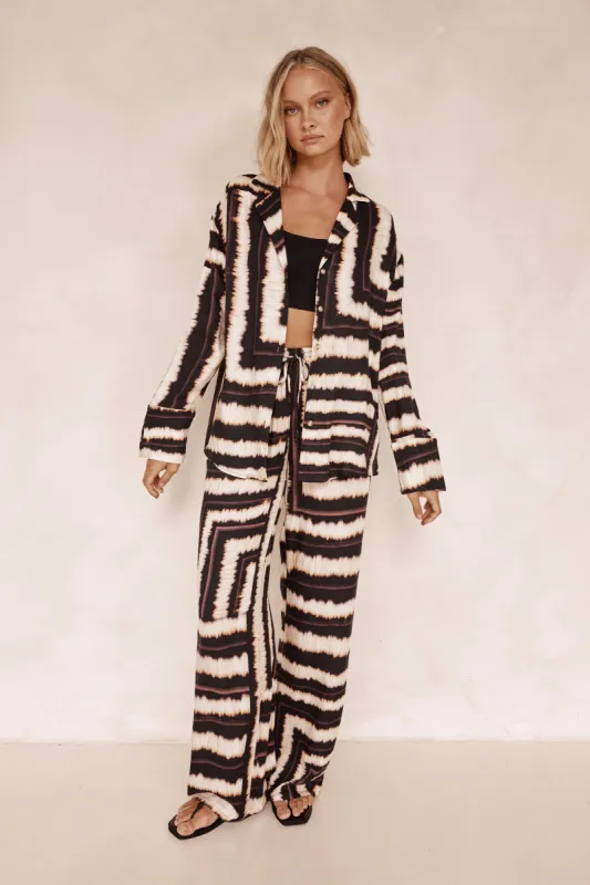 Sola Pant (Chocolate) sold by Runway Scout