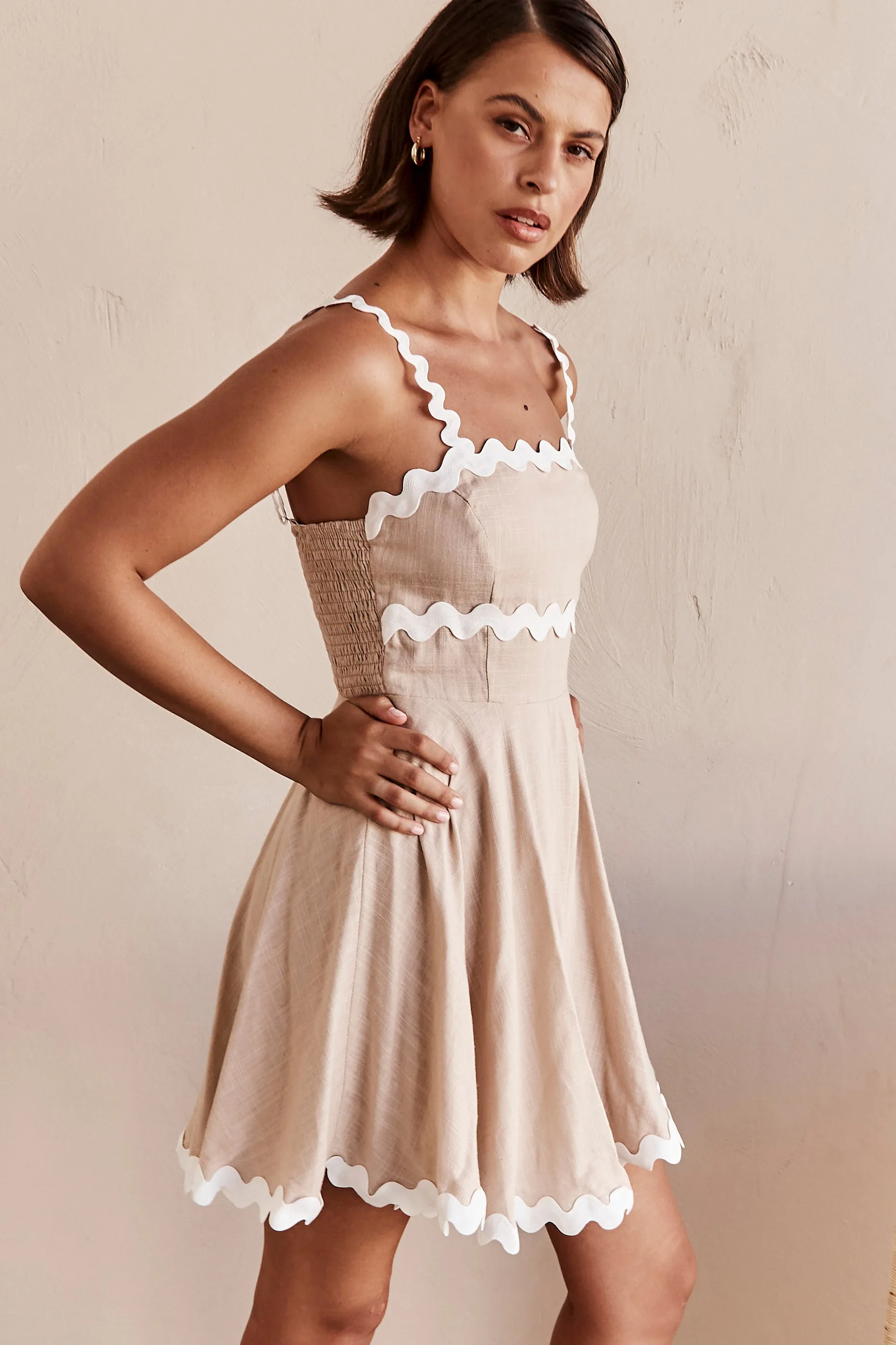 Vance Mini Dress (Beige) sold by Runway Scout