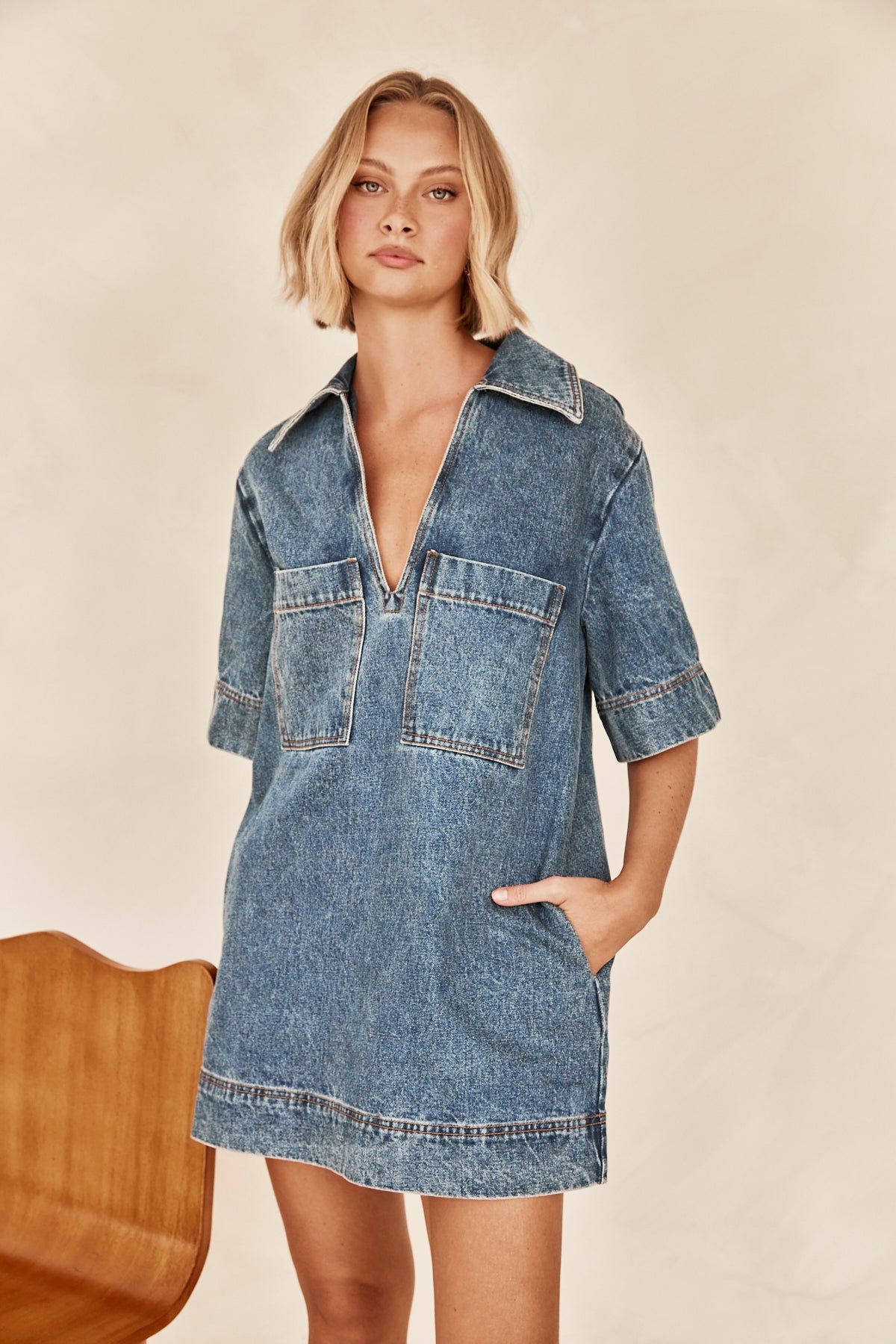 Tara Denim Mini Dress (Blue) sold by Runway Scout