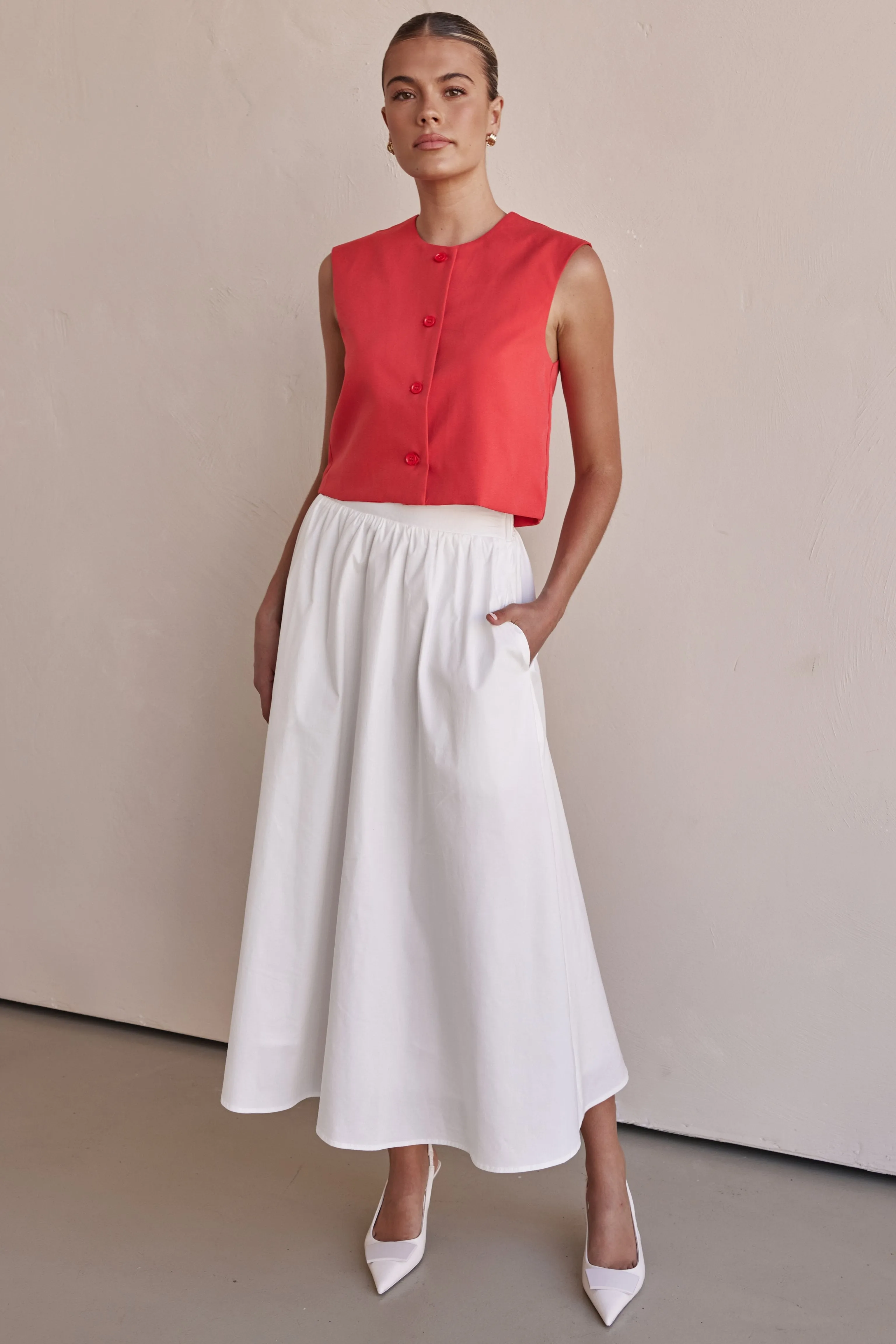 Conley Midi Skirt (White) sold by Runway Scout