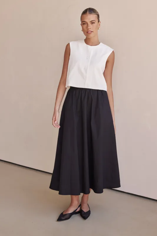 Conley Midi Skirt (Black) sold by Runway Scout