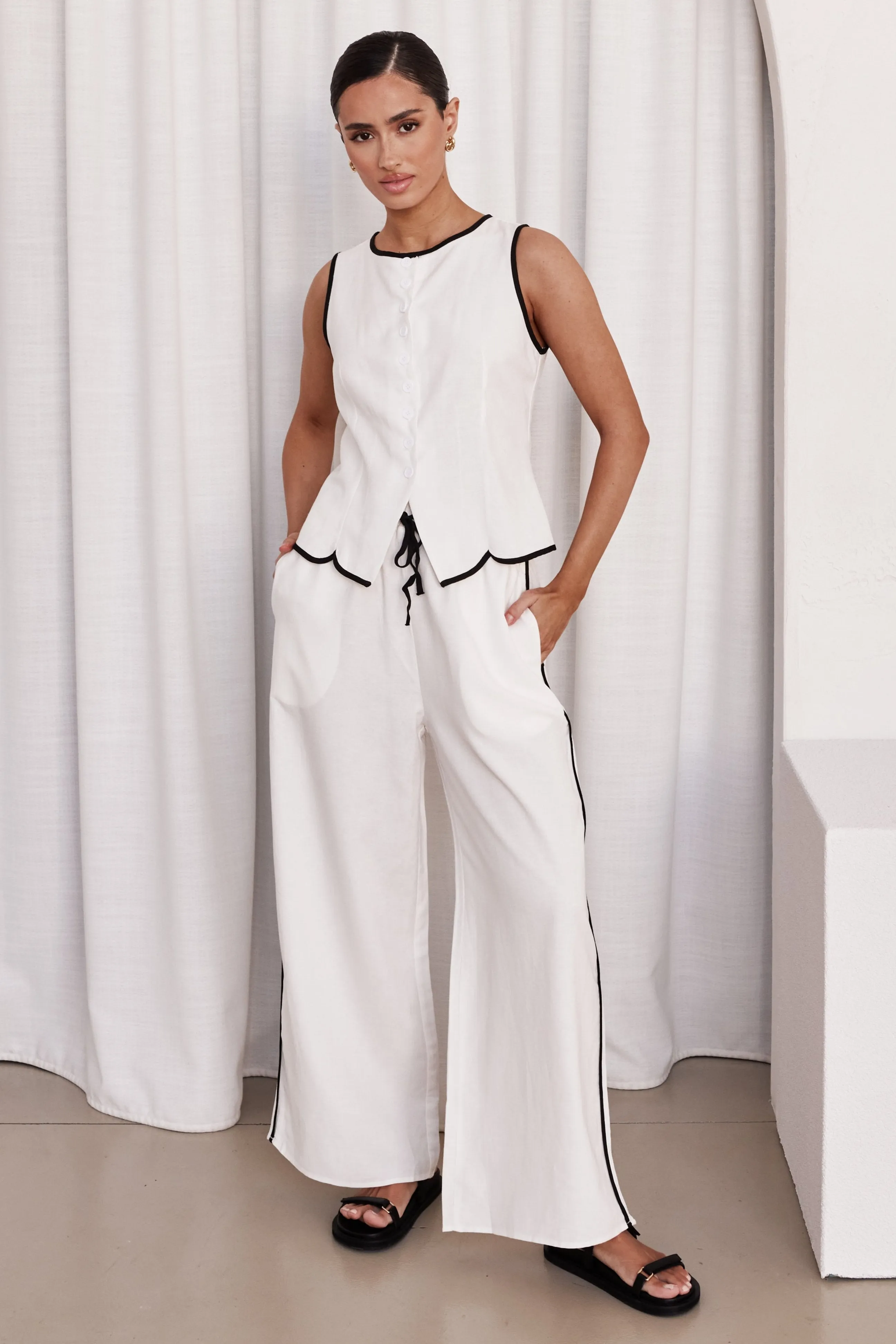 Opal Pant (White) sold by Runway Scout
