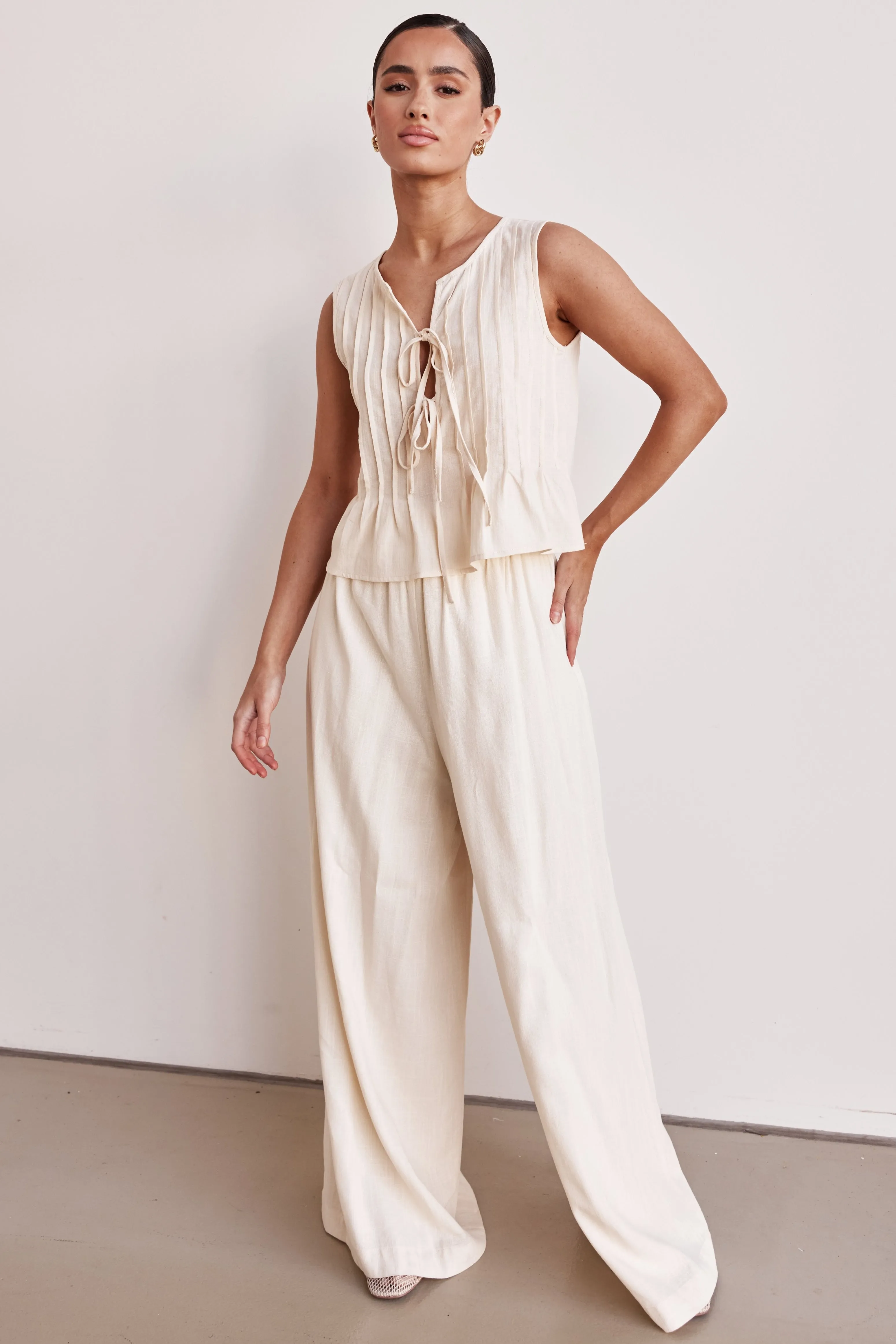 Harper Top (Cream) sold by Runway Scout