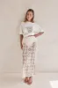 Ashton Maxi Skirt (Cream) sold by Runway Scout