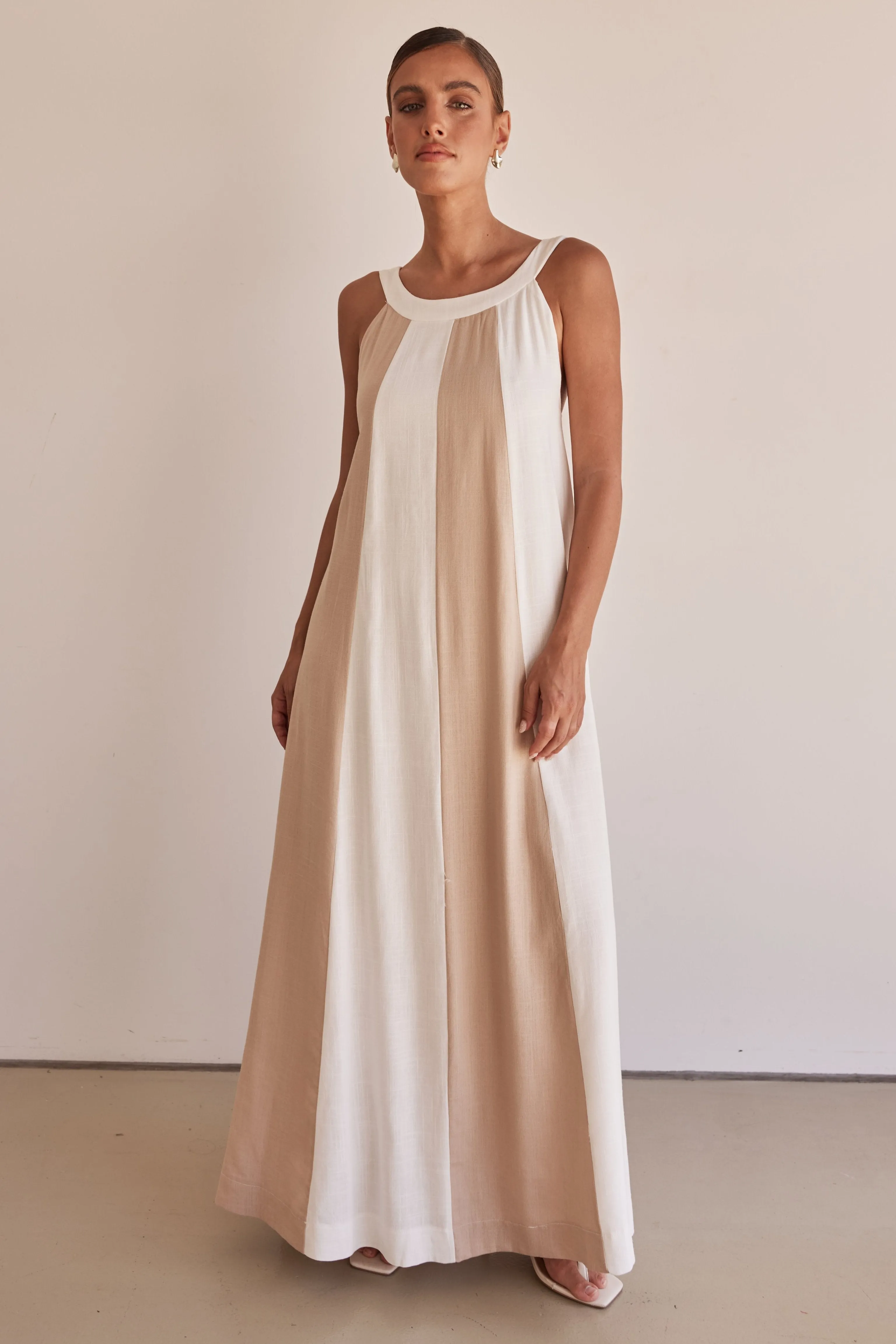 Delphine Maxi Dress (Beige) sold by Runway Scout