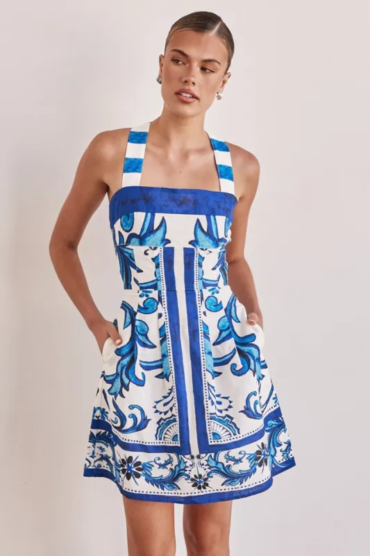Zayna Mini Dress (Blue) sold by Runway Scout