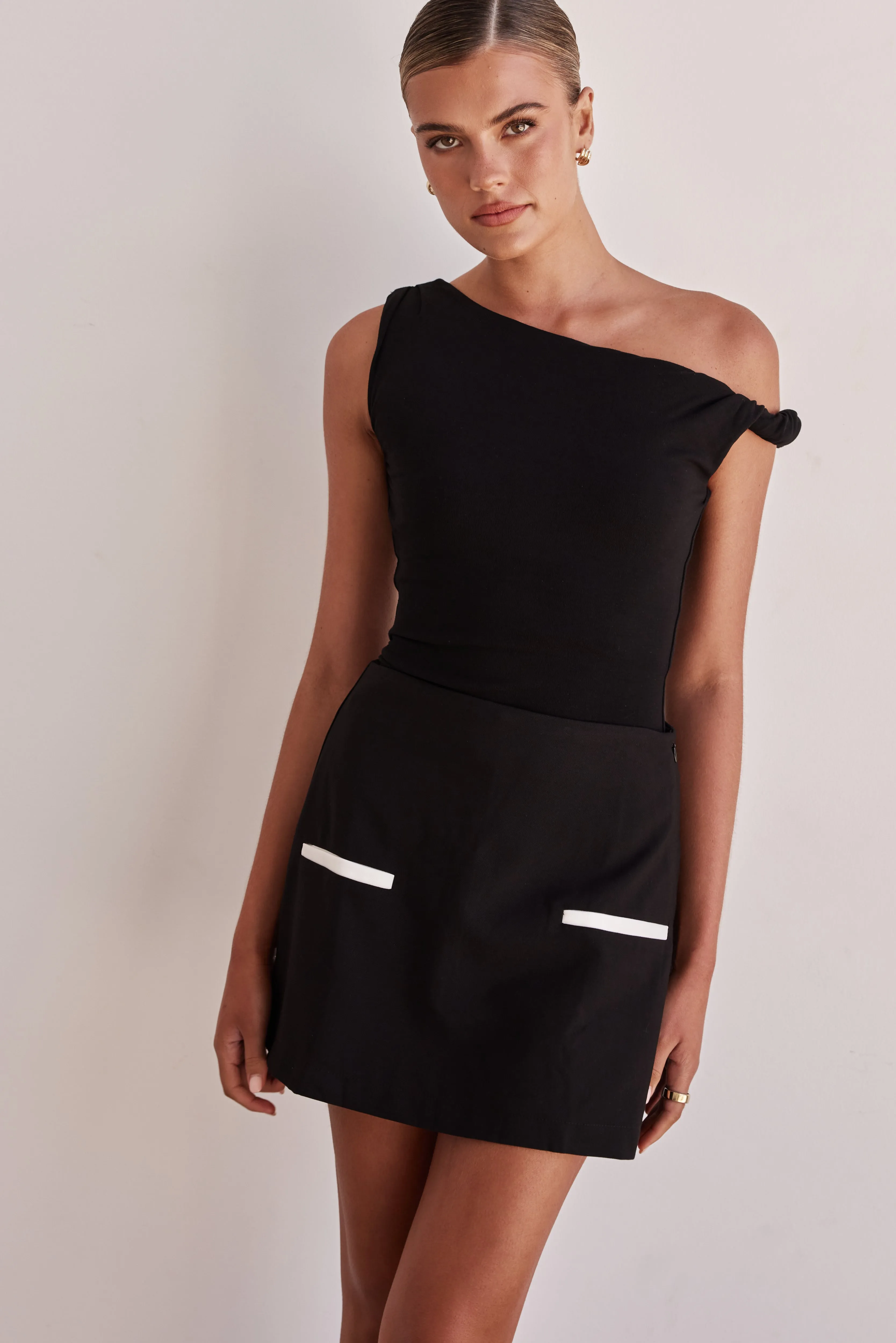 Maya Mini Skort (Black) sold by Runway Scout product image thumbnail 3