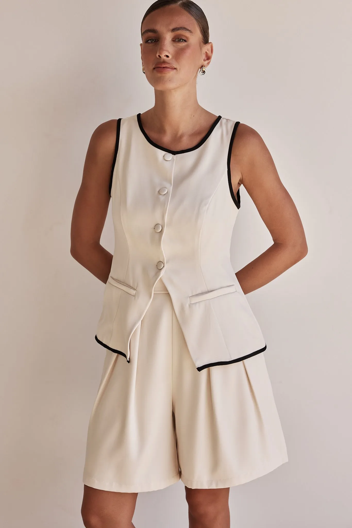 Leila Vest (Beige) sold by Runway Scout