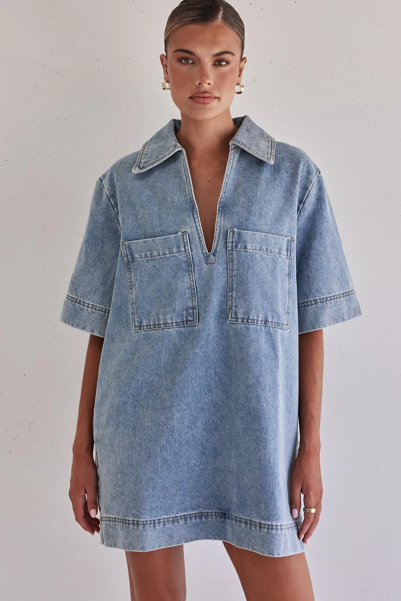 Tara Denim Mini Dress (Light Blue) sold by Runway Scout