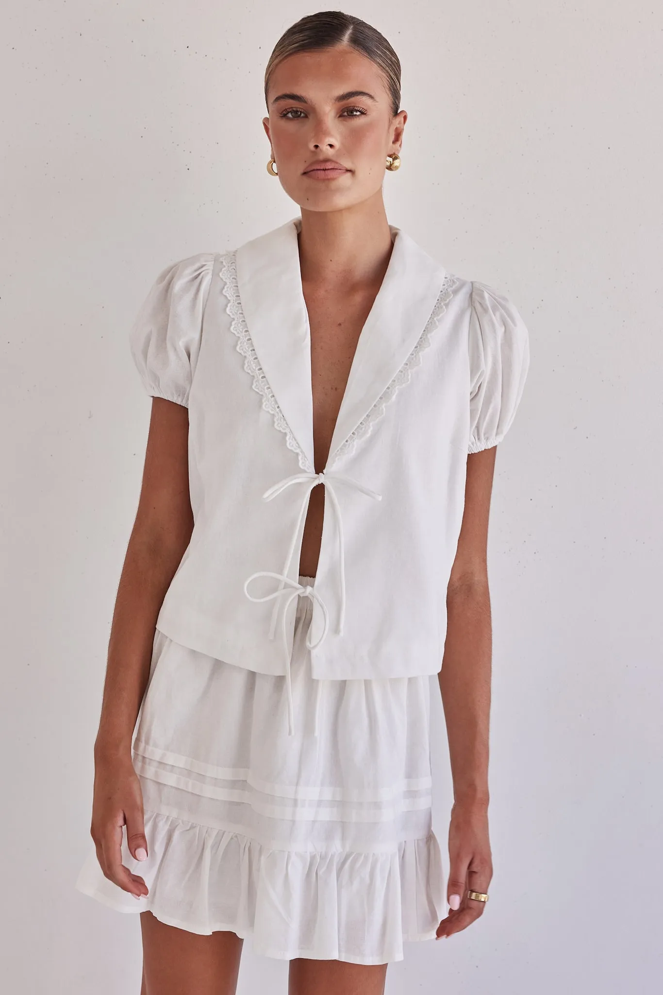 Emina Top (White) sold by Runway Scout
