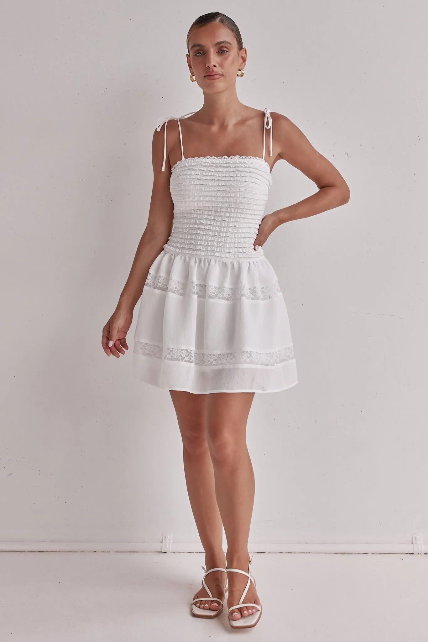 Jasmine Mini Dress (White) sold by Runway Scout
