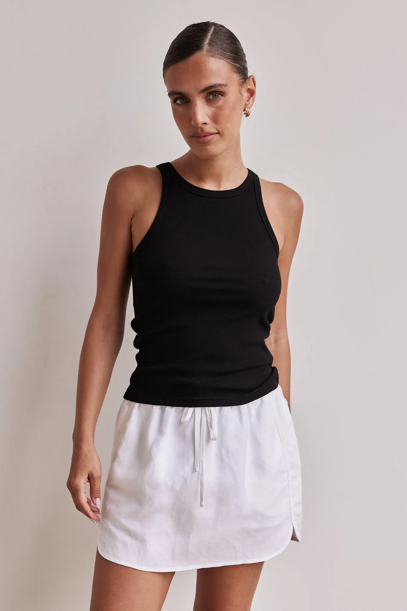Elise Top (Black) sold by Runway Scout