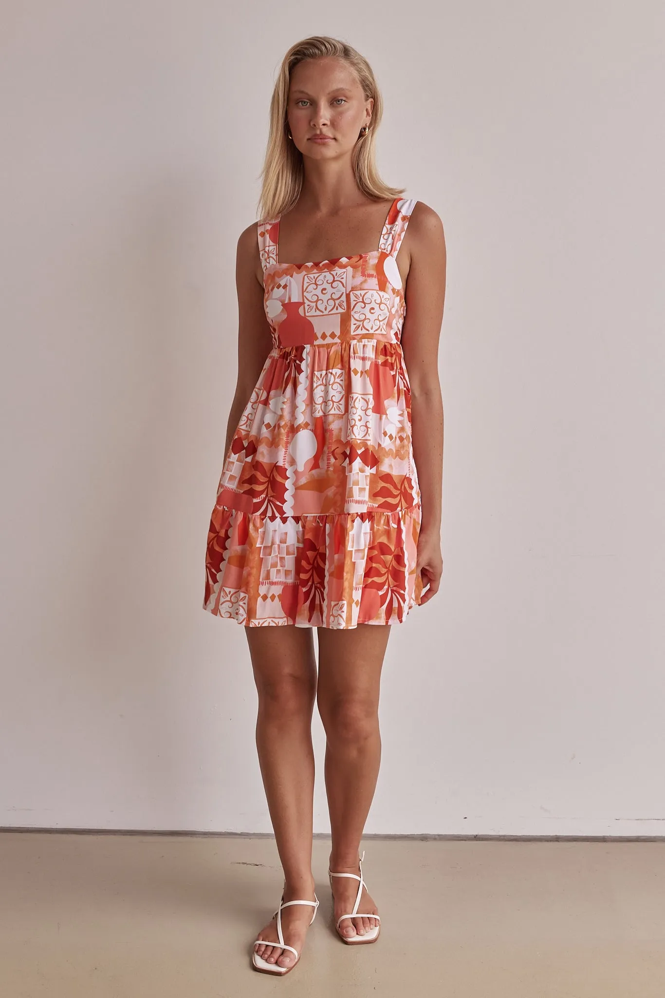 Maggie Mini Dress (Orange) sold by Runway Scout