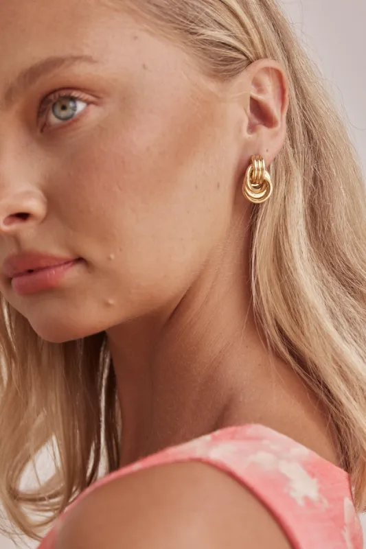 Lucy Earrings (Gold) sold by Runway Scout