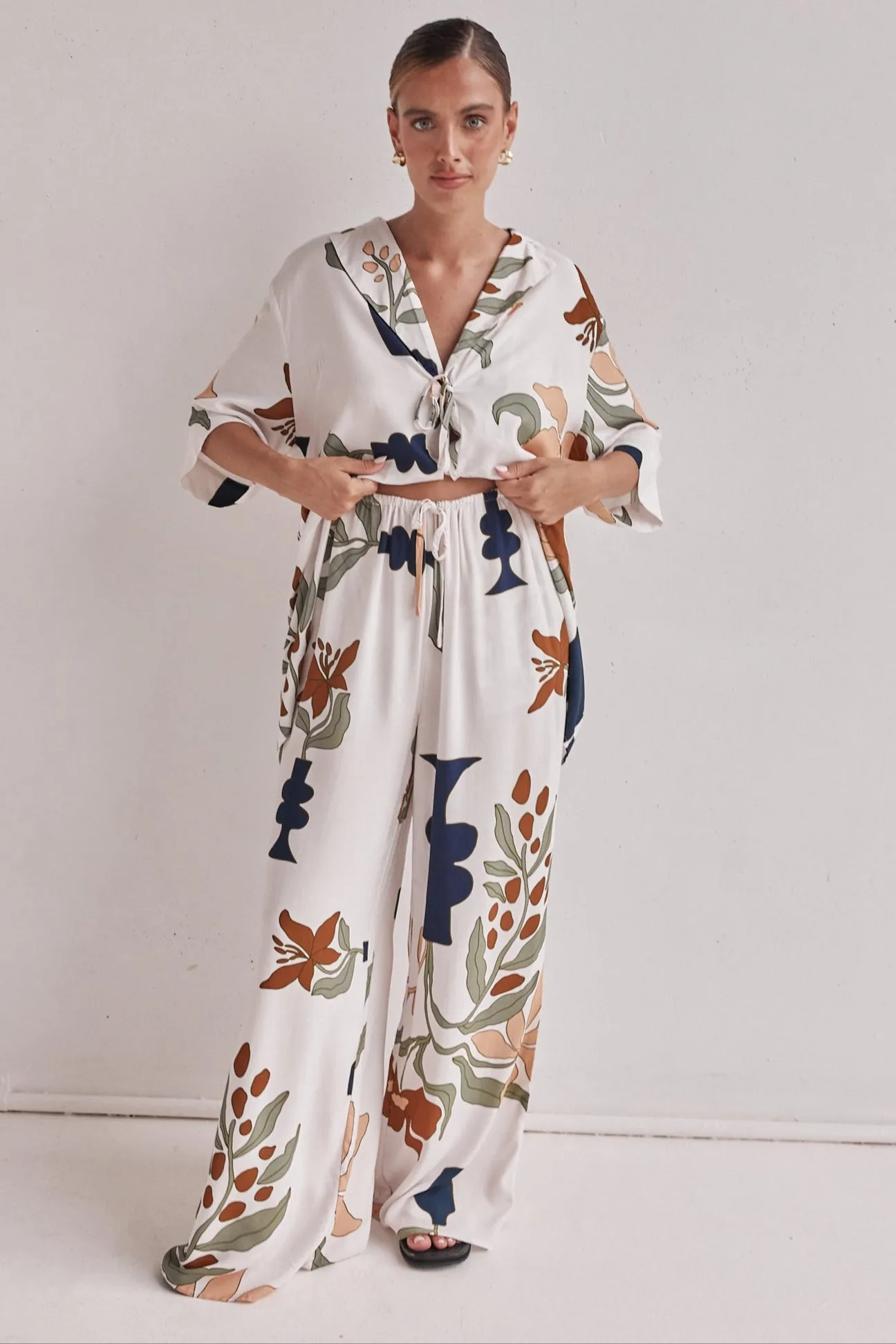 Olive Pant (White) sold by Runway Scout