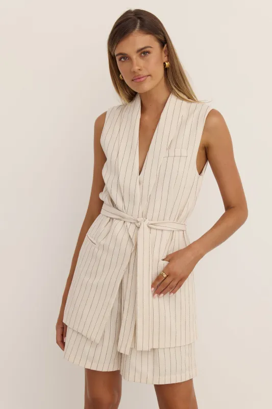 Sara Vest (Beige) sold by Runway Scout