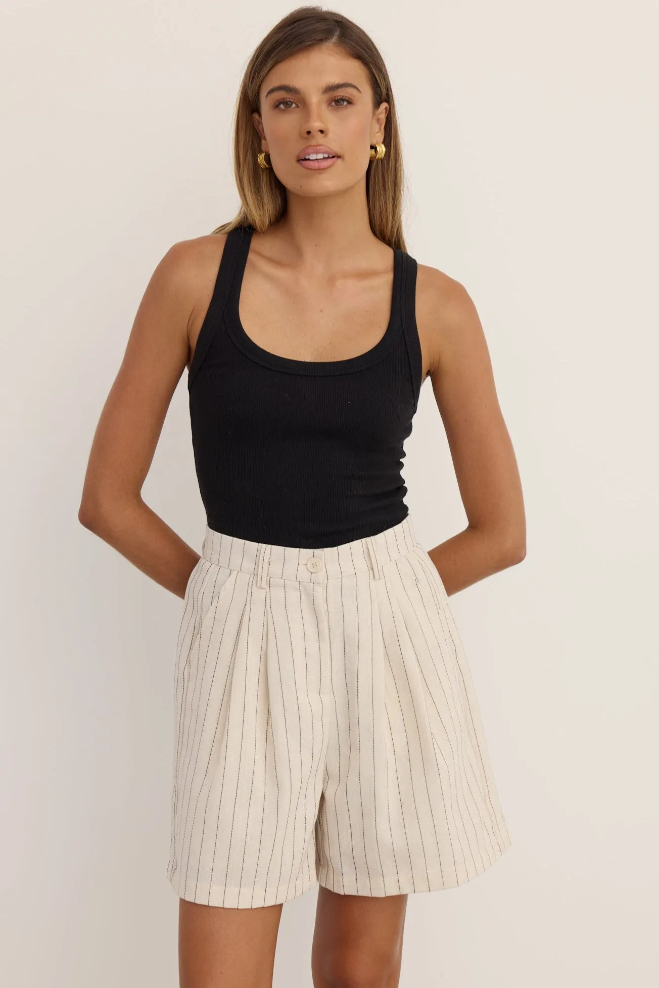 Sara Short (Beige) sold by Runway Scout